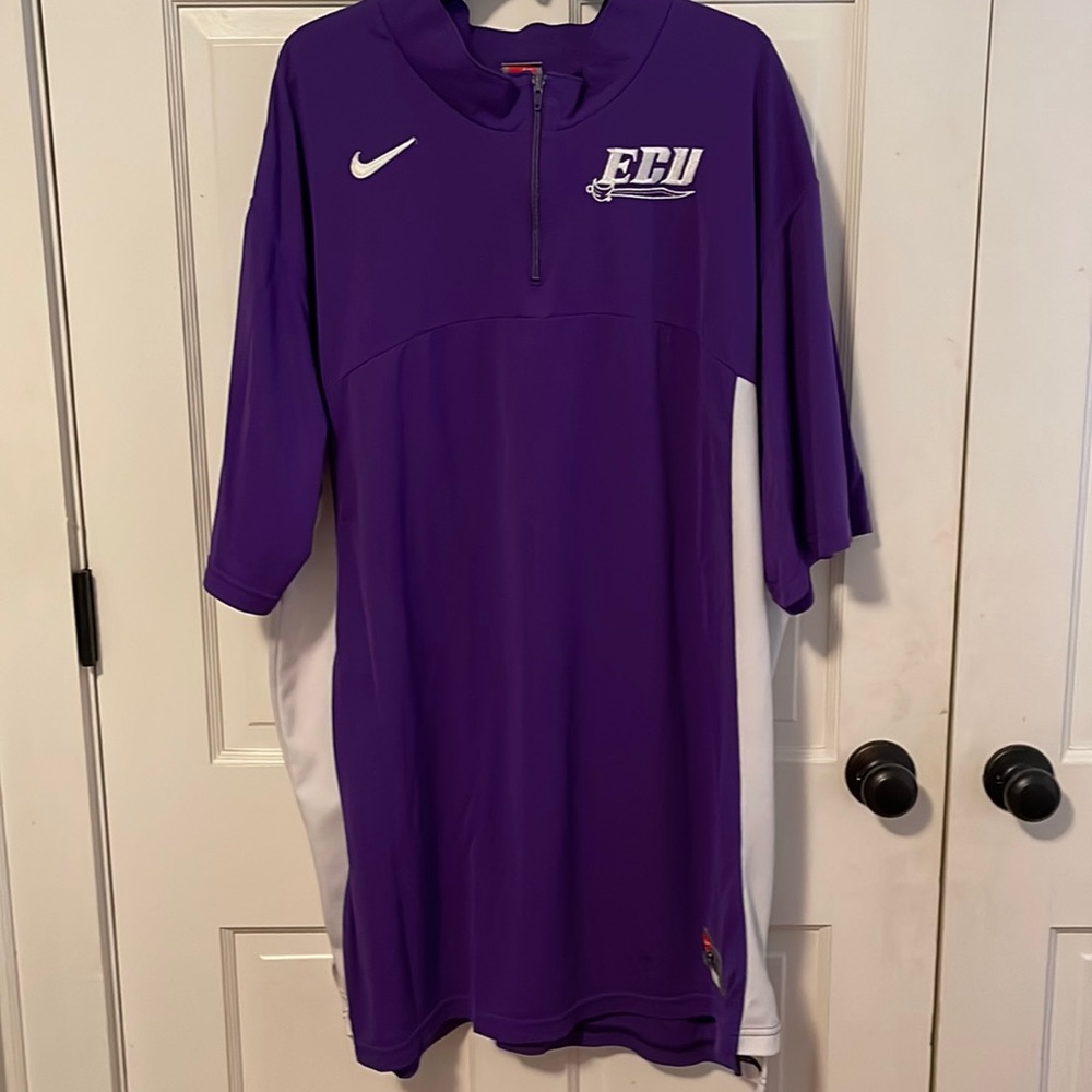 East Carolina University team worn basketball warm up shirt. Nike